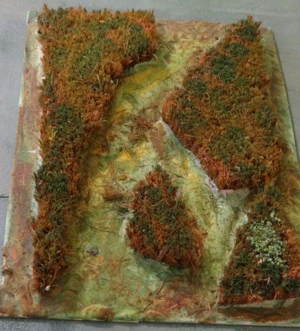 Le champ de blé roulé par le passage des troupes , un classique maintenant mais pratique. A défaut d'interstices suffisants (25mm) , on peut poser les plaquettes dessus. 