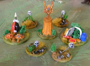 Divers articles prévus dans les scénarii : le buisson aux offrandes, le masque d'or, le trésor, les repères à tête de mort.